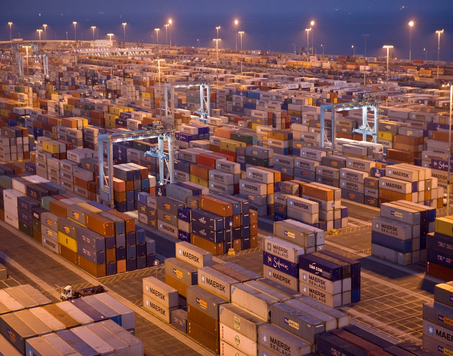 Intermodal container yard at dusk.